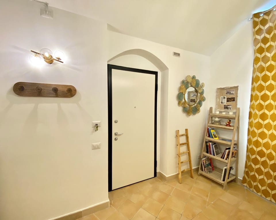 Luxury Townhome, City View | Living area | Flat-screen TV