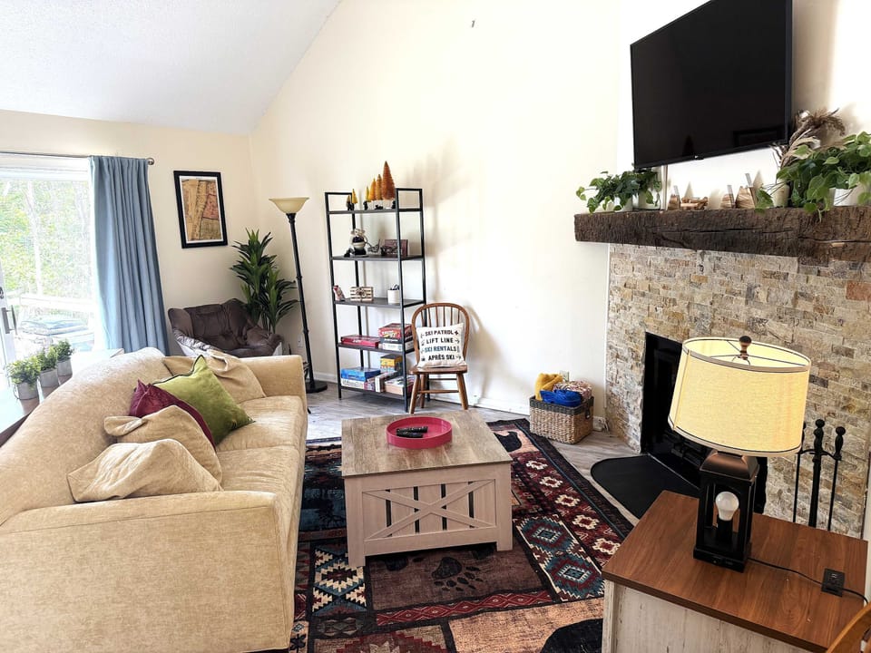 Beautiful Country Decor updated with Wood Fireplace and Stunning Mountain Views..  Smart TV as well