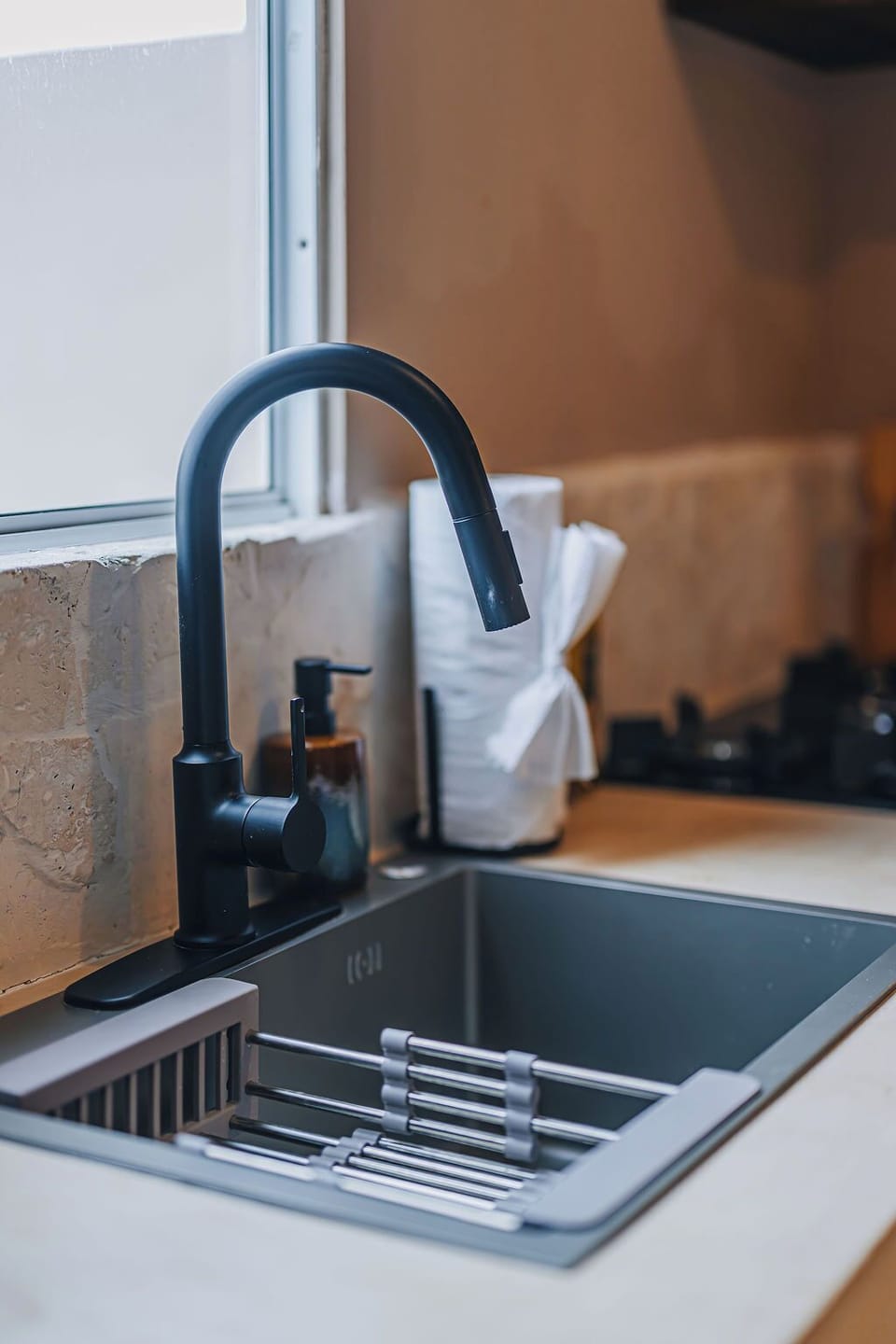 Clean and well-equipped kitchen with modern fixtures and all the basics for a comfortable stay.

