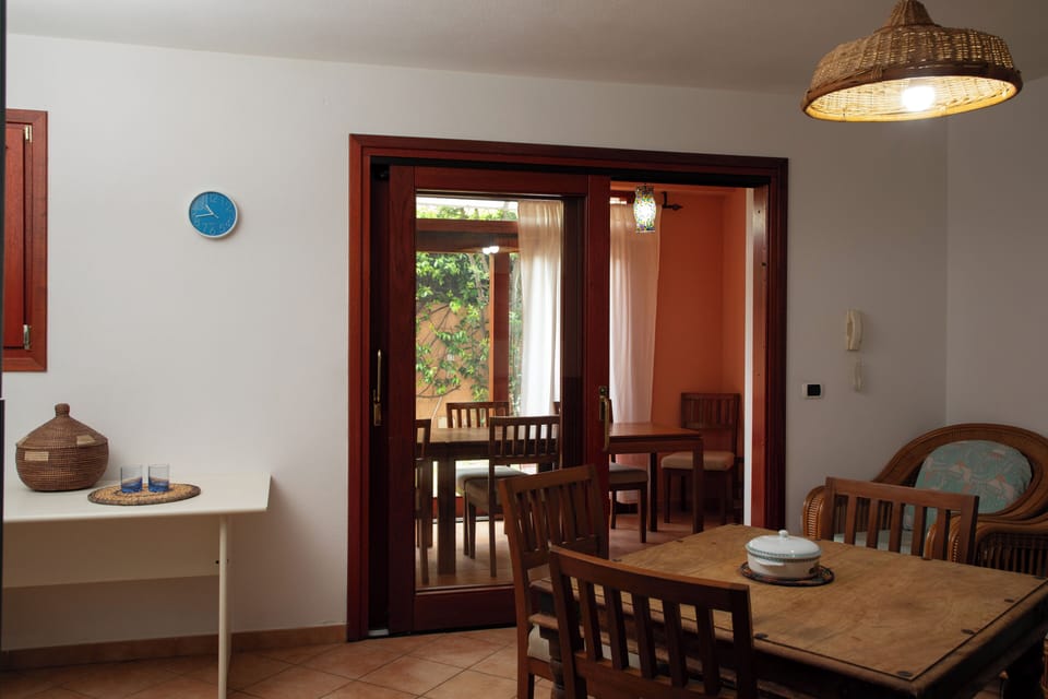 Apartment, 4 Bedrooms | Living area | 30-inch TV with satellite channels