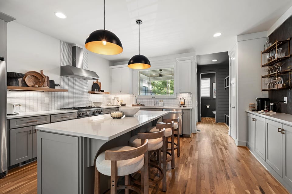 Open kitchen keeps everyone connected...