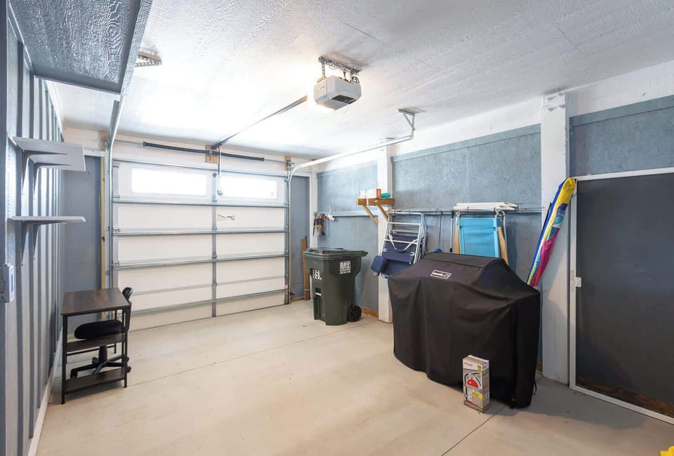 Garage With Storage Space and a Work Space