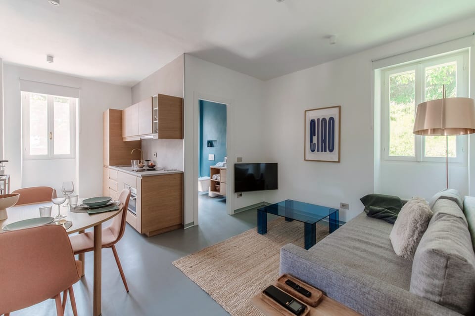 Apartment, Patio, Lake View | Living area | 30-inch TV with digital channels