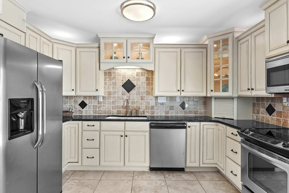 Townhome, Multiple Beds, Patio (Sun-Kissed Shores) | Private kitchen | Fridge, microwave, stovetop, dishwasher