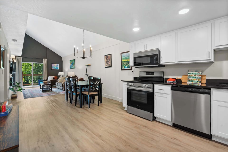 The open, airy kitchen offers ample storage & every home comfort