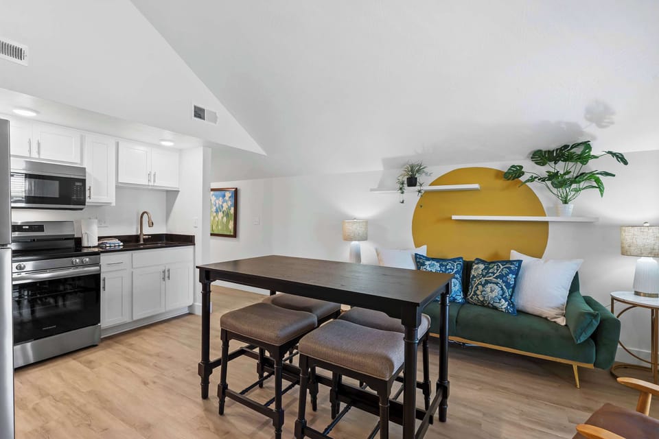 Gather for meals together at the dining table, seating 4