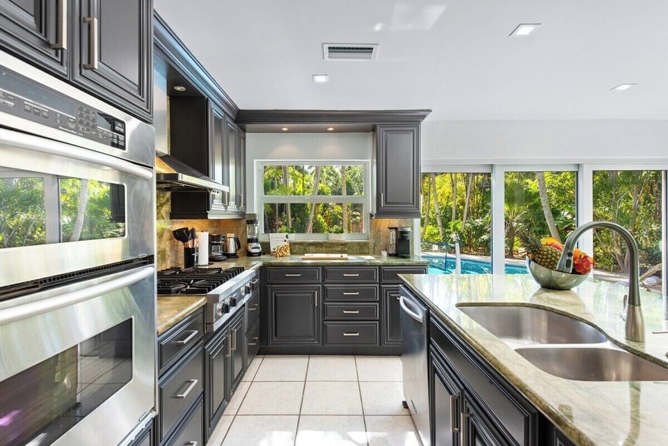 Enjoy an amazing kitchen with an amazing view of the pool and backyard.