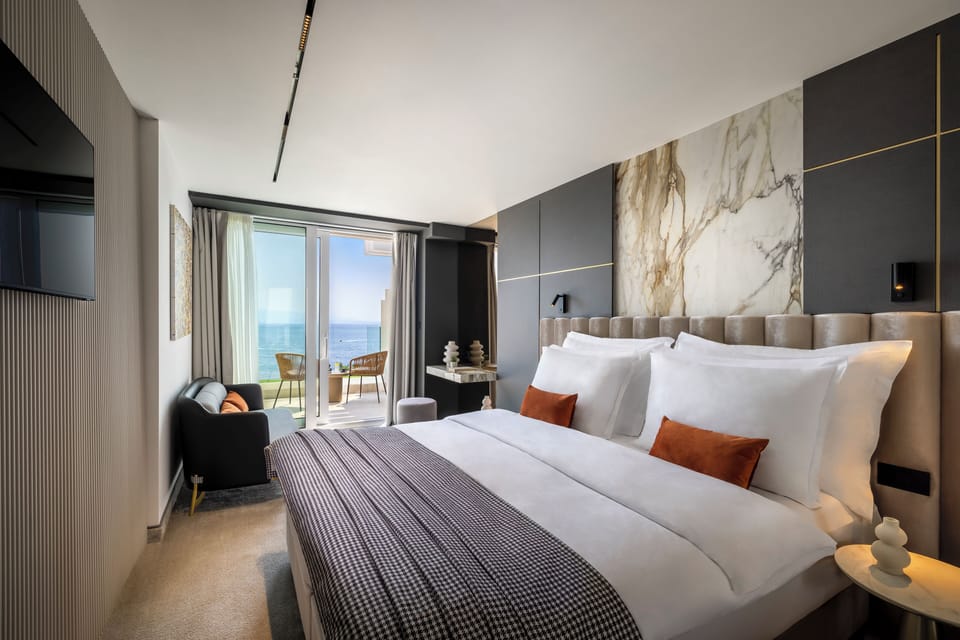 Deluxe Terrace Room with Sea View | Down comforters, minibar, in-room safe, desk