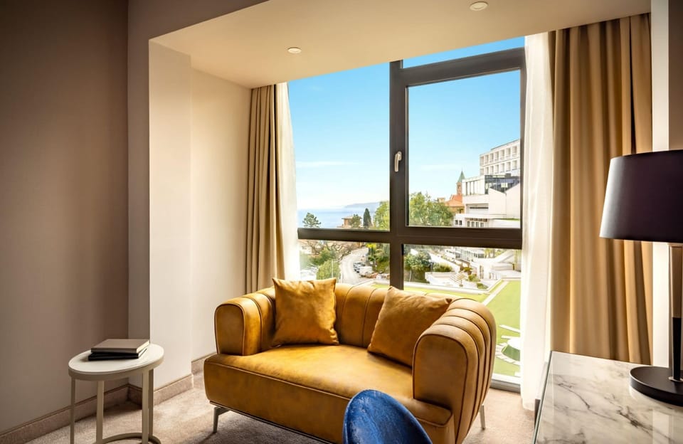Superior Double or Twin Room, Partial Sea View | Down comforters, minibar, in-room safe, desk