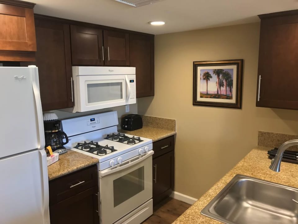 One Bedroom | Private kitchen | Full-size fridge, microwave, oven, dishwasher