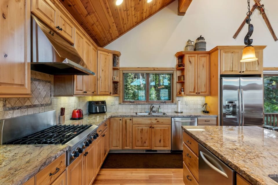 Nicely appointed gourmet kitchen with high-end stainless appliances.