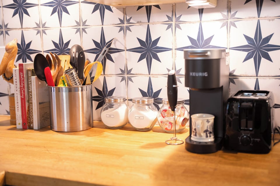 K Cups, Creamer, Sugar, Frother provided.