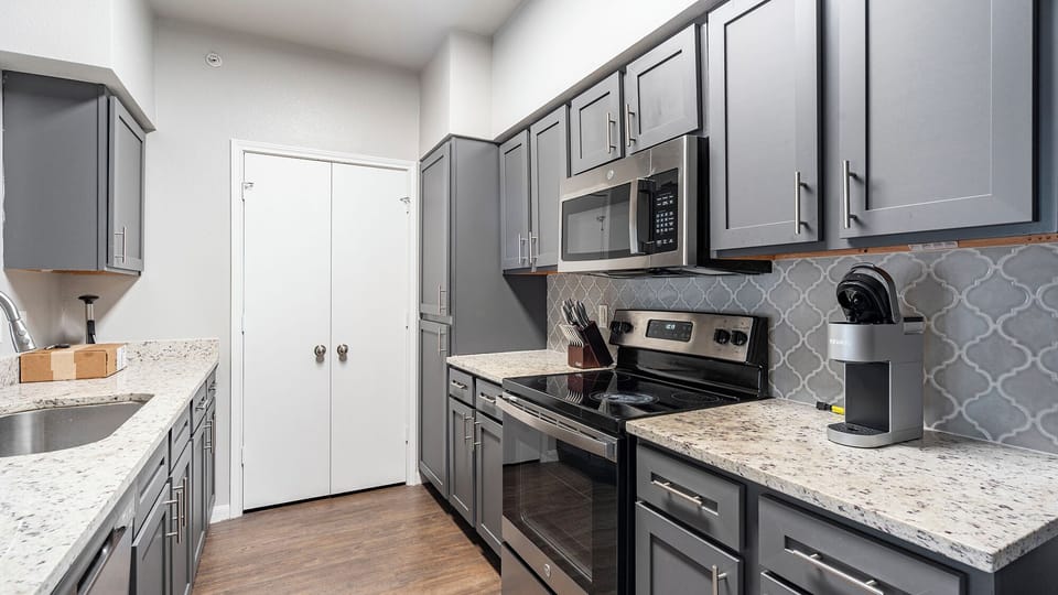 Apartment, 2 Bedrooms | Private kitchen | Full-size fridge, microwave, oven, stovetop