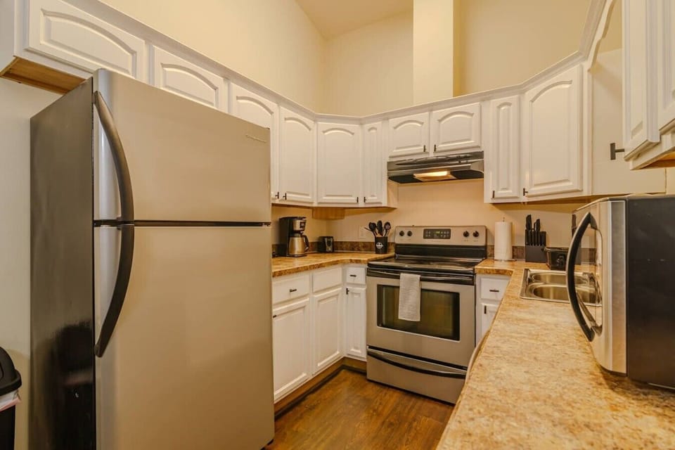 13. Fully stocked Kitchen with all cooking essentials, blender, coffee maker, toaster, Knives, pots
