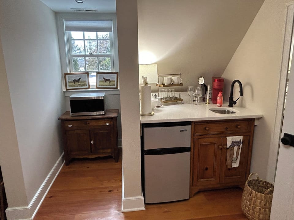 Kitchenette: AirFryer, Keurig, Tea Kettle, Microwave, Plates/Utensils in cabinet