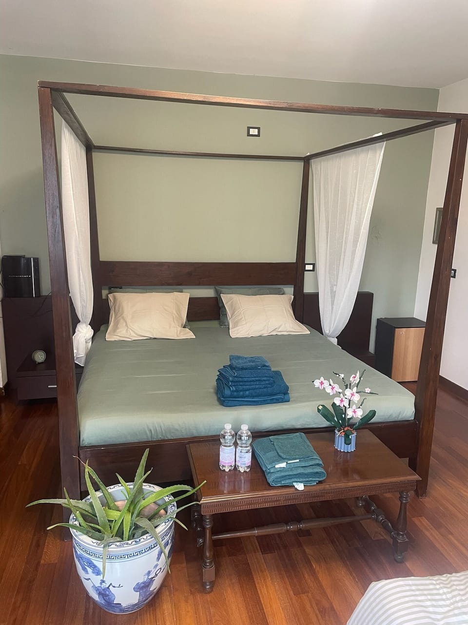 Deluxe Quadruple Room, 1 Bedroom, Patio, Garden View | In-room safe, desk, laptop workspace, WiFi (free)