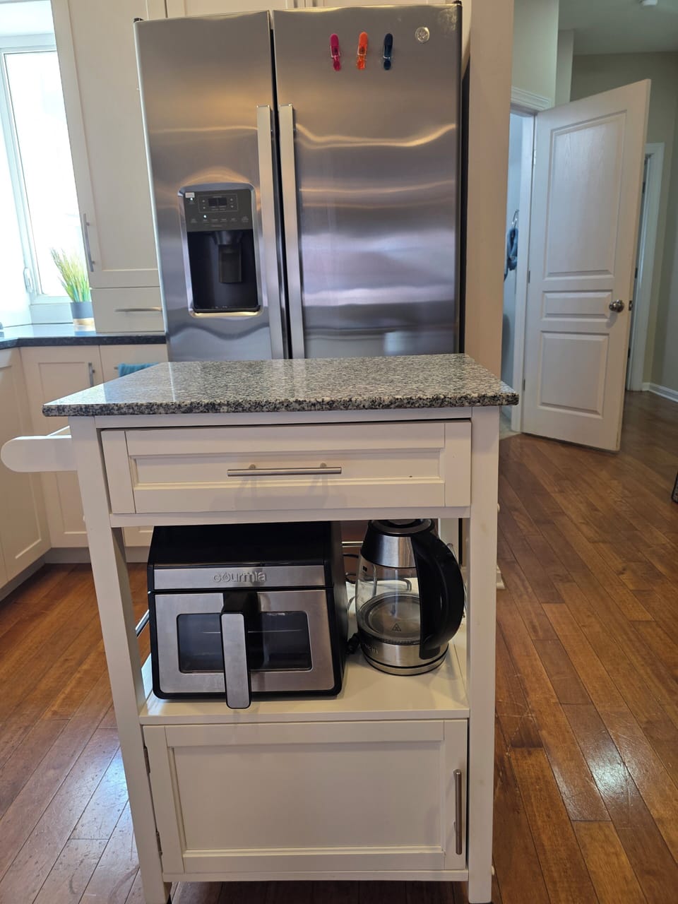 Bright & airy kitchen with all the appliances and utensils to make a delish meal