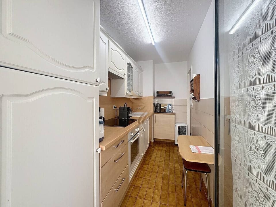 Cuisine fonctionnelle entièrement équipée, idéale pour préparer vos repas pendant votre séjour.