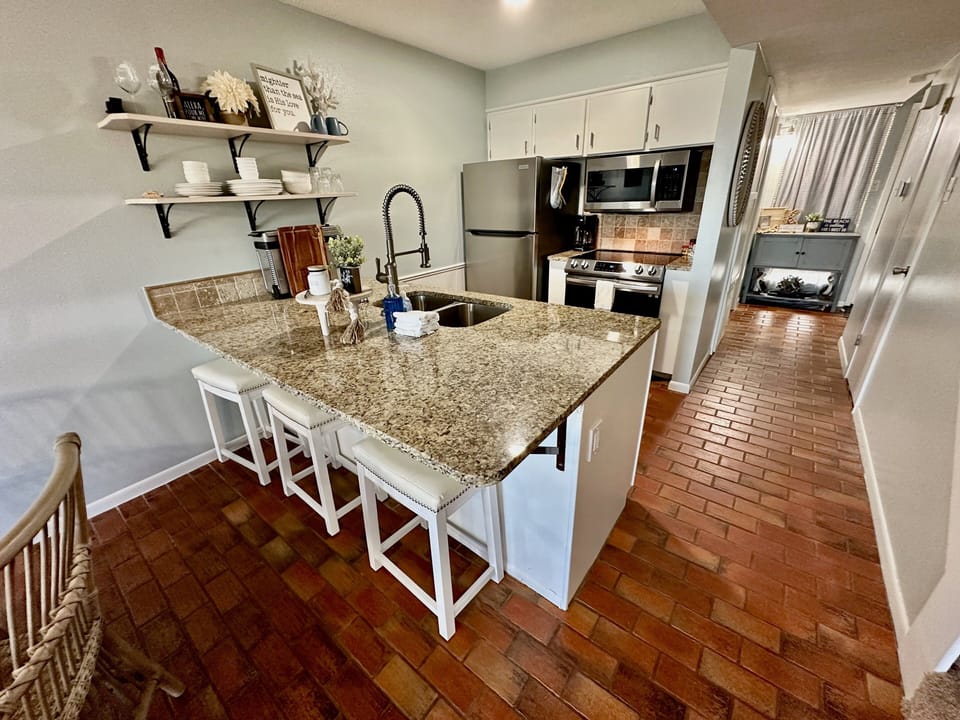 Kitchen with breakfast Table and Bar Stools