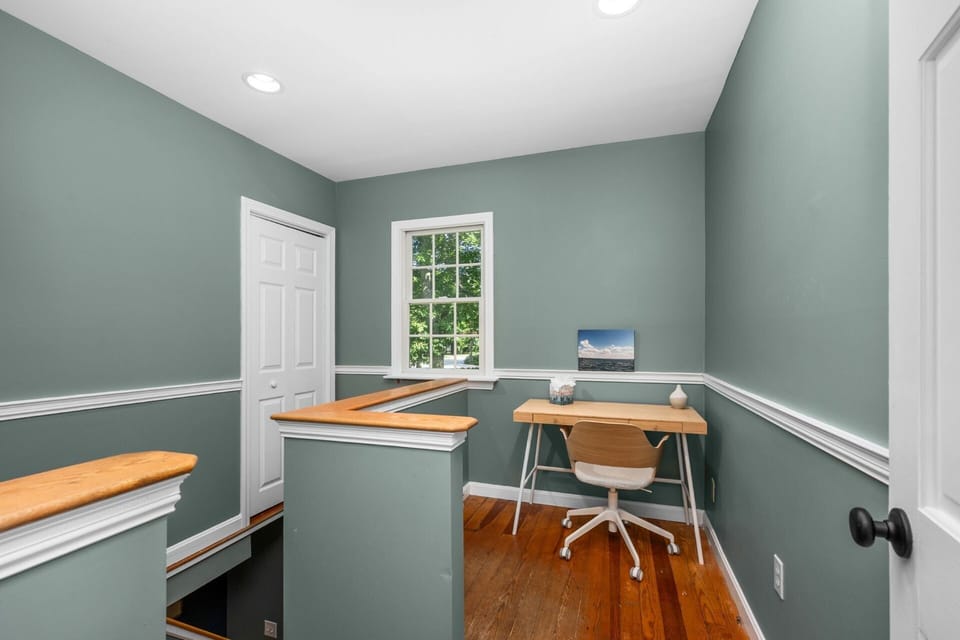 Work desk in the hallway leading to the lower level