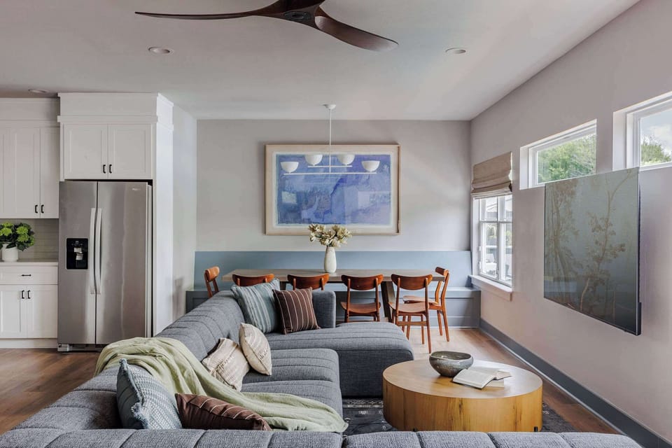 Home B | Open Concept Living Room | 75" Smart TV | Natural Light | First Floor
