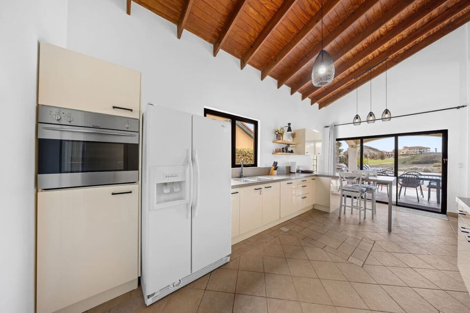 This bright, fully equipped kitchen has everything you need to cook up your favorite meals—plus a view that makes cooking feel like part of the vacation.