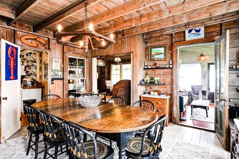 Dining area and doorway to the side closed in porch