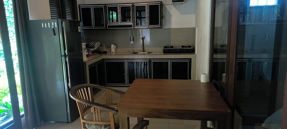 Family Room, Garden View | Private kitchen