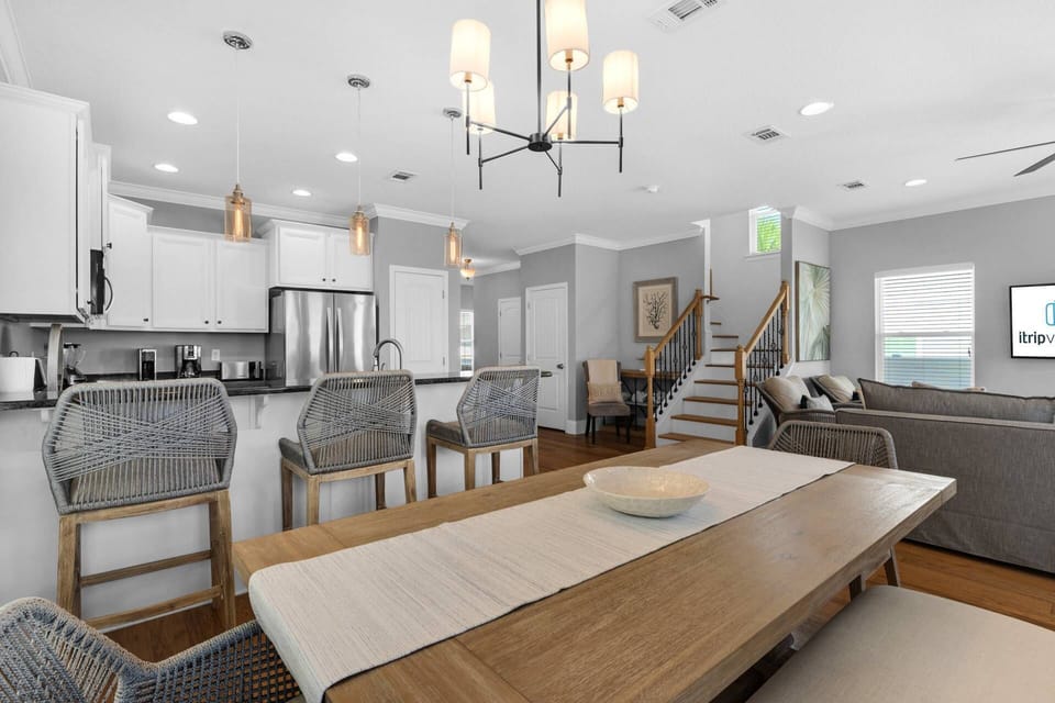Spacious dining area with plush table seating for 8