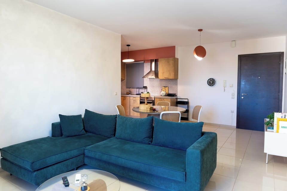 Comfort Apartment, City View | Living area | 42-inch Smart TV with cable channels, Netflix, streaming services