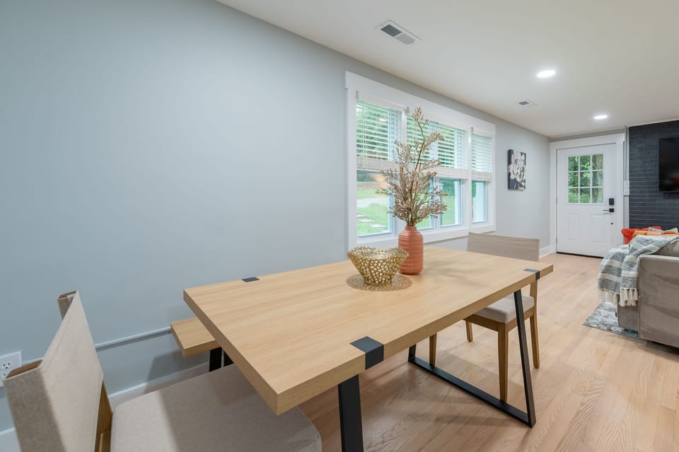 Simple and elegant dining space perfect for meals or catching up on work.