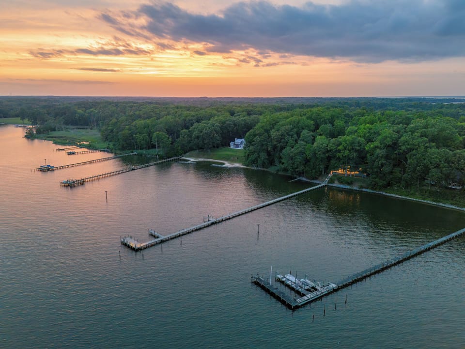 Waterfront: Immerse yourself in stunning sunset views over serene waters and lush greenery!