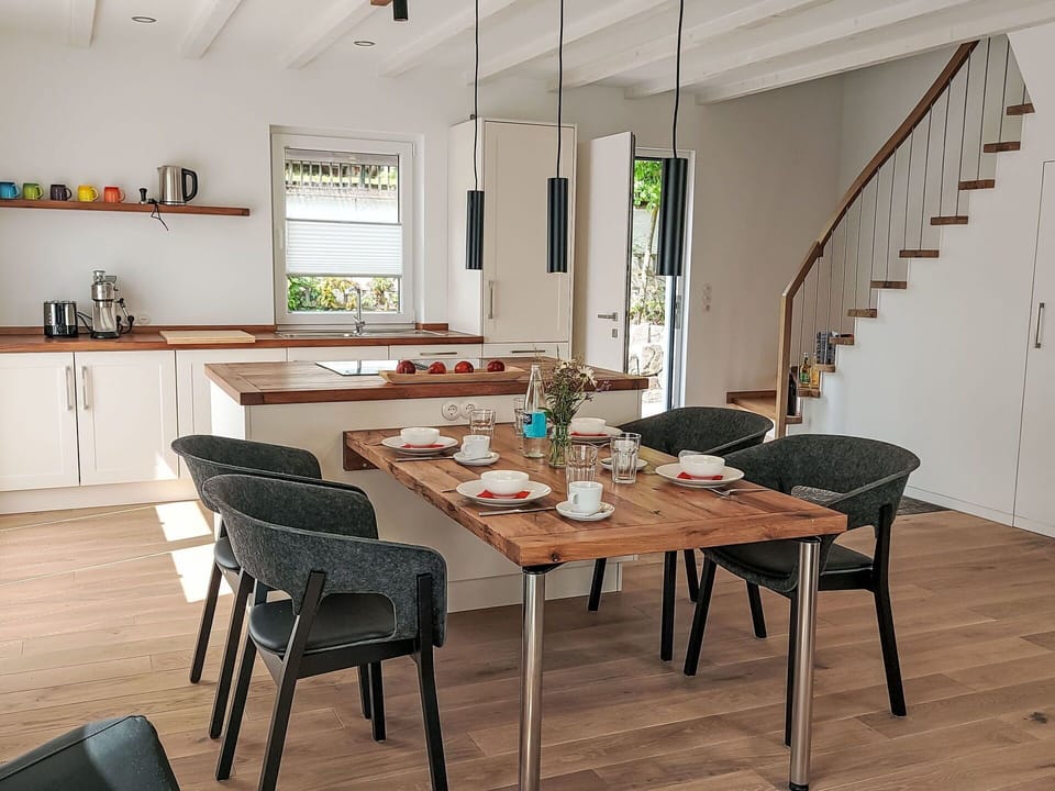 Furniture, Chair, Flooring, Table, Dining Room, Interior Design, Wood, Kitchen & Dining Room Table, Floor, Lighting