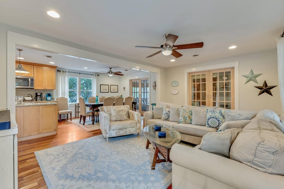 Relax in this bright, open-concept space where your living room flows seamlessly into the dining area and fully-equipped kitchen.