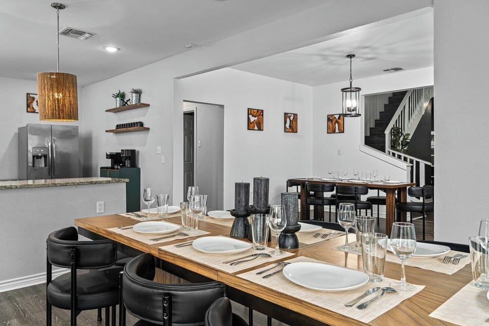 Spacious open dining area with seating for groups and modern kitchen access