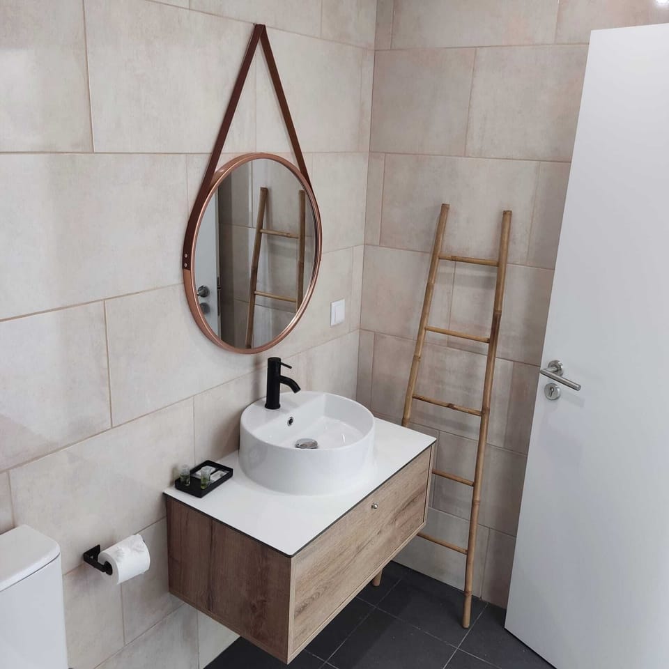 Comfort Double Room, Courtyard View | Bathroom | Towels, soap, toilet paper