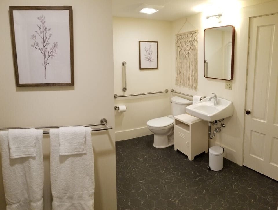 Suite, 1 King Bed | Bathroom | Shower, hair dryer, towels, soap