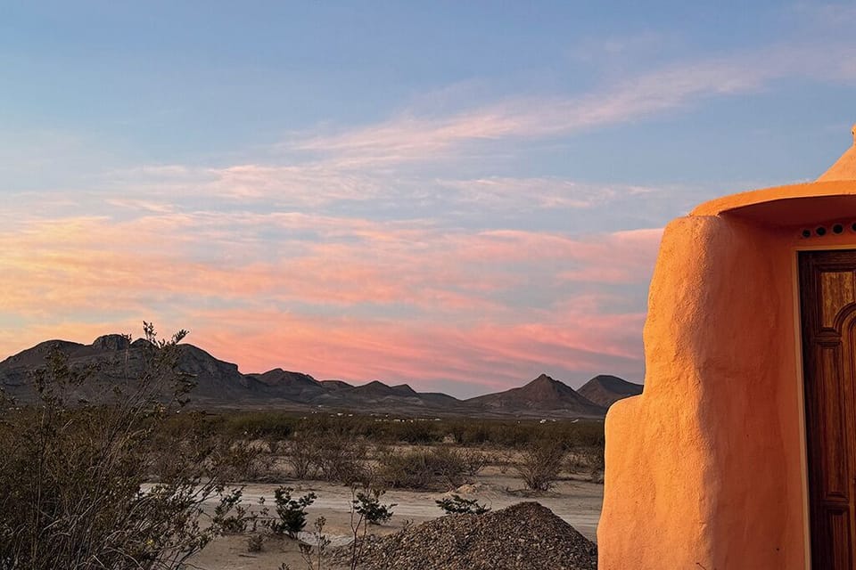 Candy-Colored Sunset shown at Sanadora Terlingua Glamping site near Big Bend.