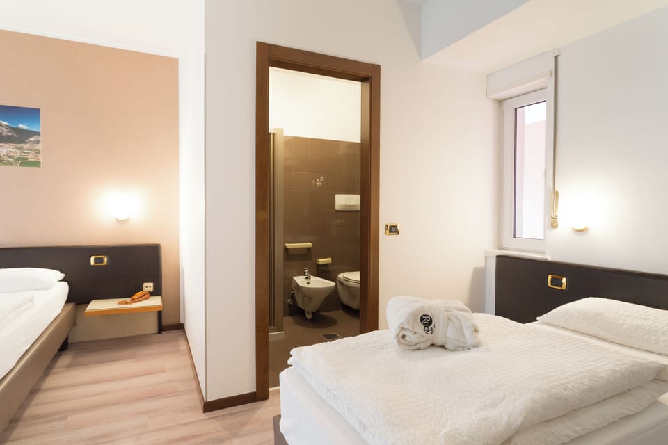 Standard Quadruple Room, Balcony | Free WiFi, bed sheets