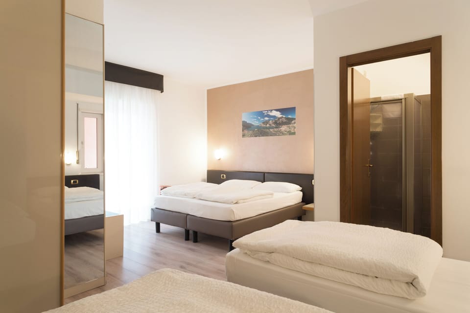 Standard Quadruple Room, Balcony | Free WiFi, bed sheets