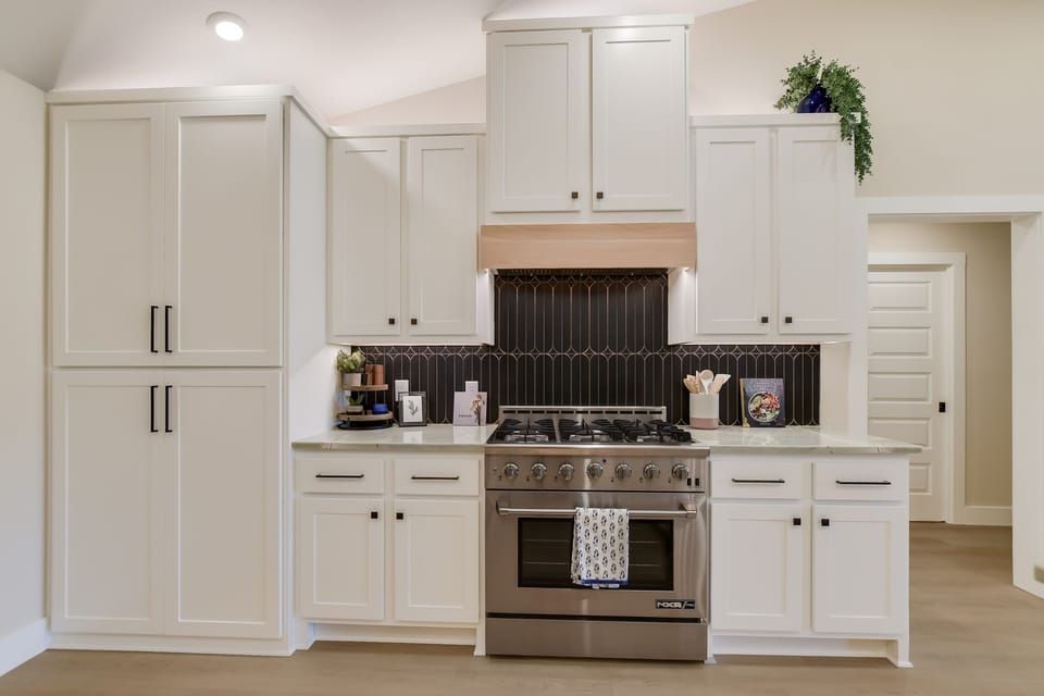 Fully stocked chef's kitchen with high end appliances. 