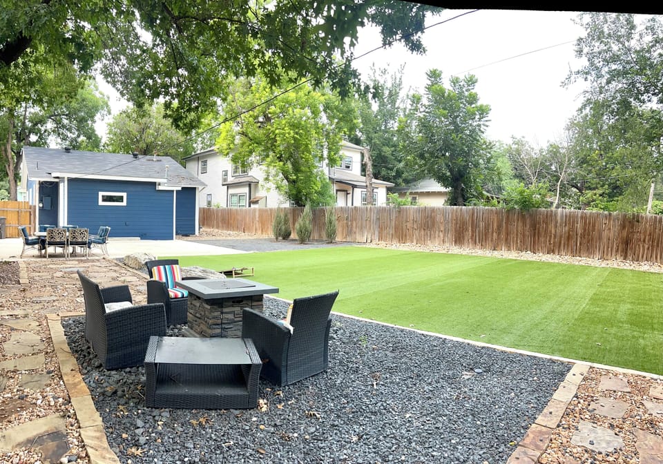 Multiple cozy sitting areas in our backyard