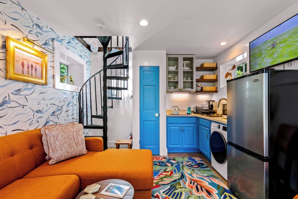 Step into style – Retro charm, recessed lighting & a spiral staircase.