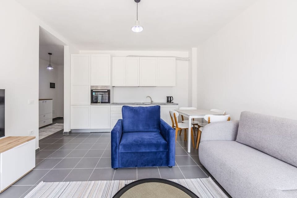 Living room and fully-equipped kitchen