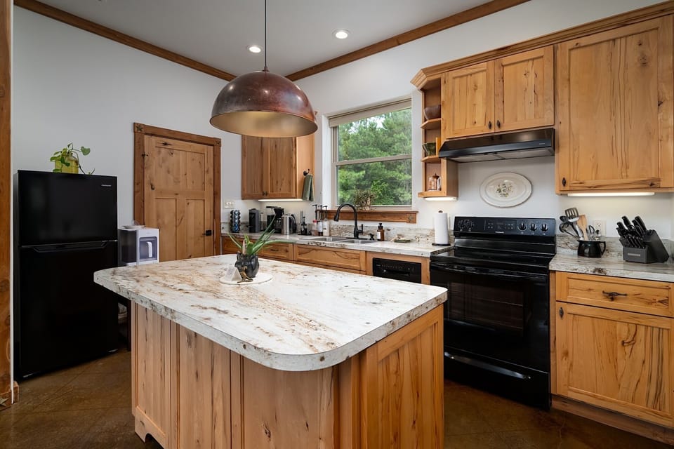Fully equipped kitchen with everything needed to prepare meals during your stay.
