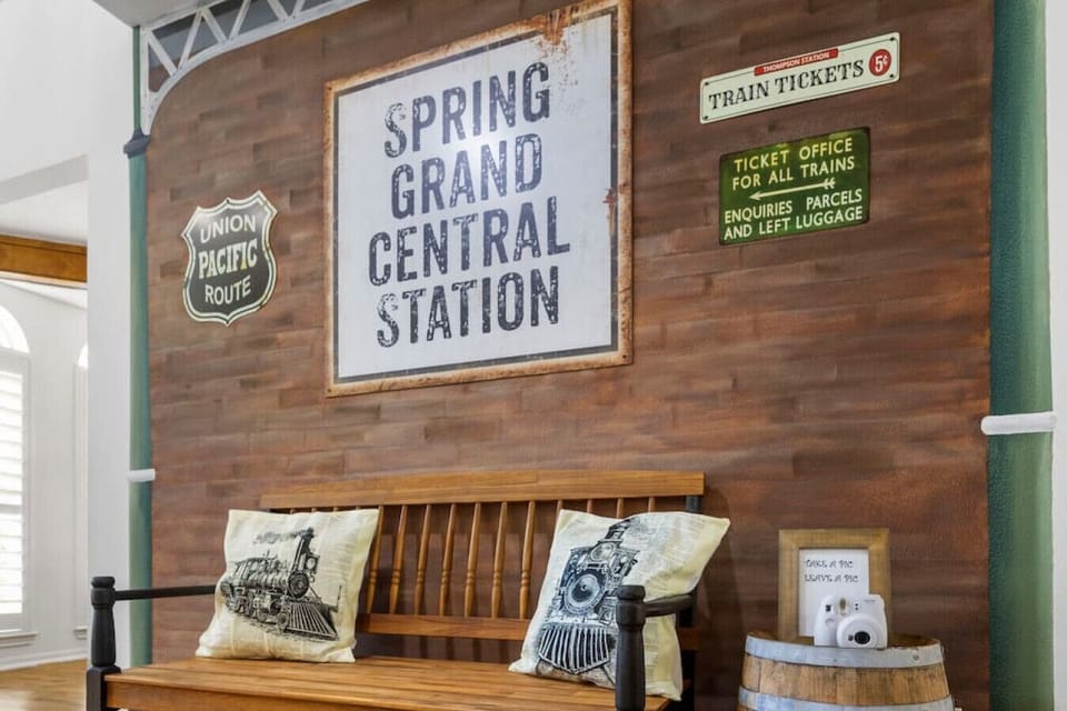 All aboard! Custom train-themed feature wall sets the tone for this one-of-a-kind Spring getaway
