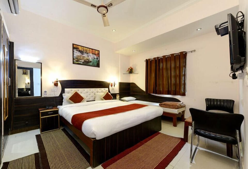 Deluxe Triple Room | Iron/ironing board, free WiFi