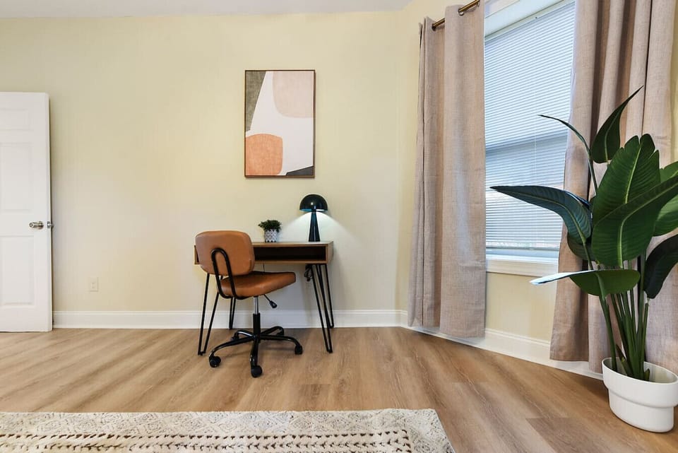 Workspace in the bedroom with natural light and modern decor