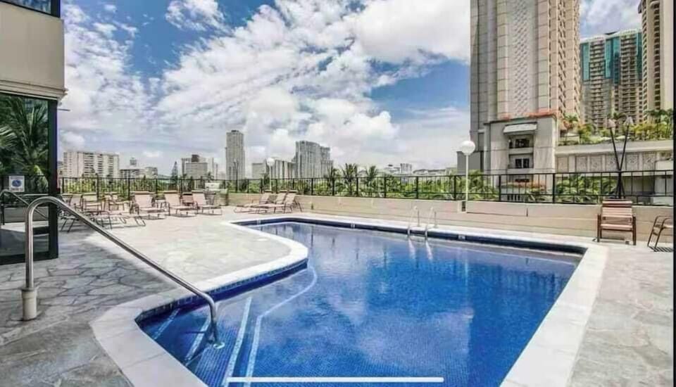 Pool on 2nd floor (actually 5th floor high), with lounge, hot tub and BBQ grill 