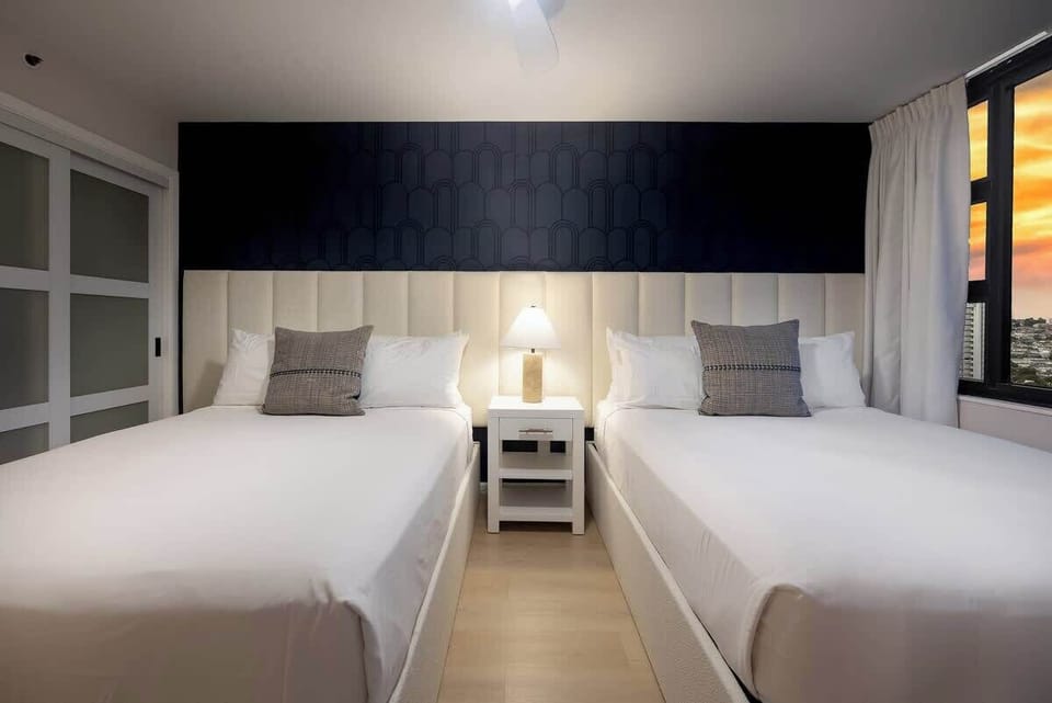 Have a relaxing sleep in your bedroom with 2 queen beds while enjoying the night views from your window.